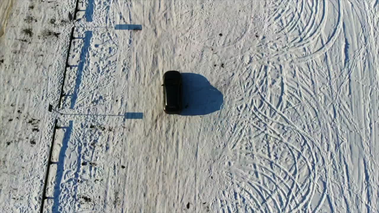 drone shot of Ice roads in Estonia during the winter snow with blue sky's