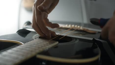 repairing guitar strings