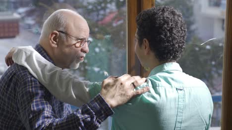 the lively and highly motivated old grandfather is having a pleasant relationship with his little grandson.