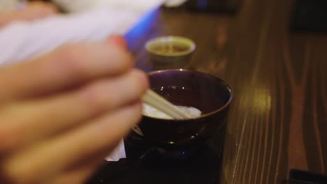 Mochi Soup in Bowl with Chopsticks
