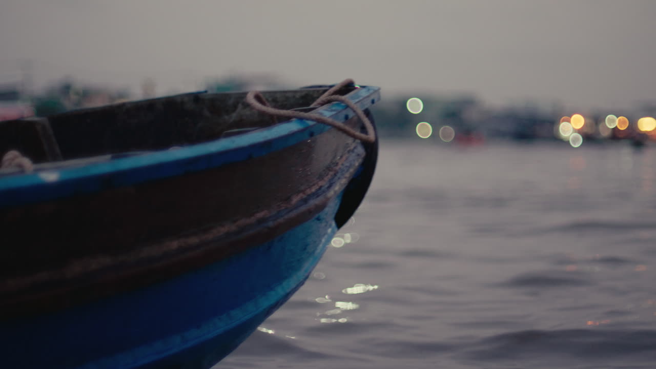 Small Blue Boat at Night