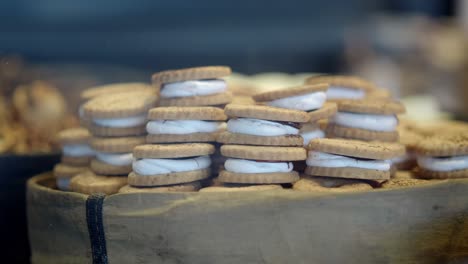 stacked sandwich cookies with white filling