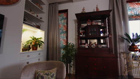 elegant living room with vintage furniture and tropical decor