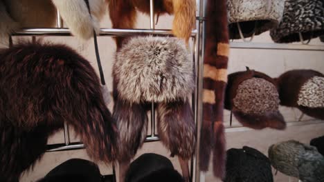 street vendors in khiva uzbekistan fortress ichan kala. traditional fur hats. 3
