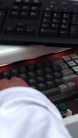 young science student typing on keyboard