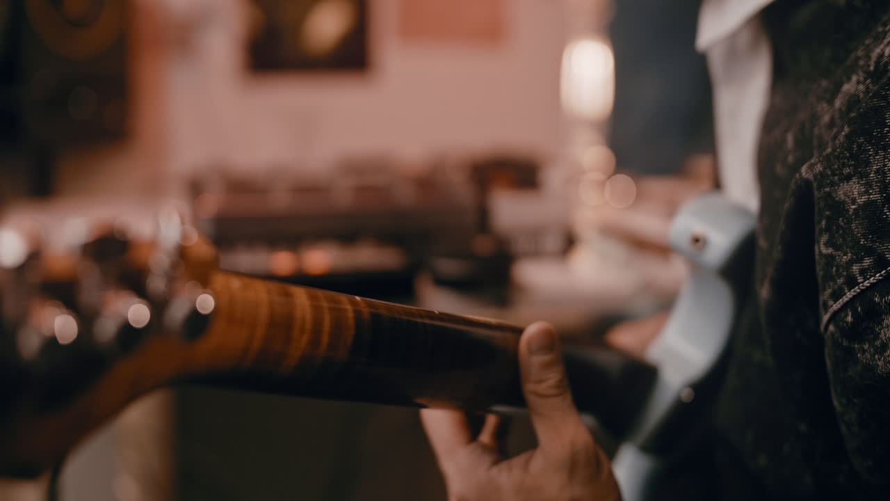 Person playing an electric guitar