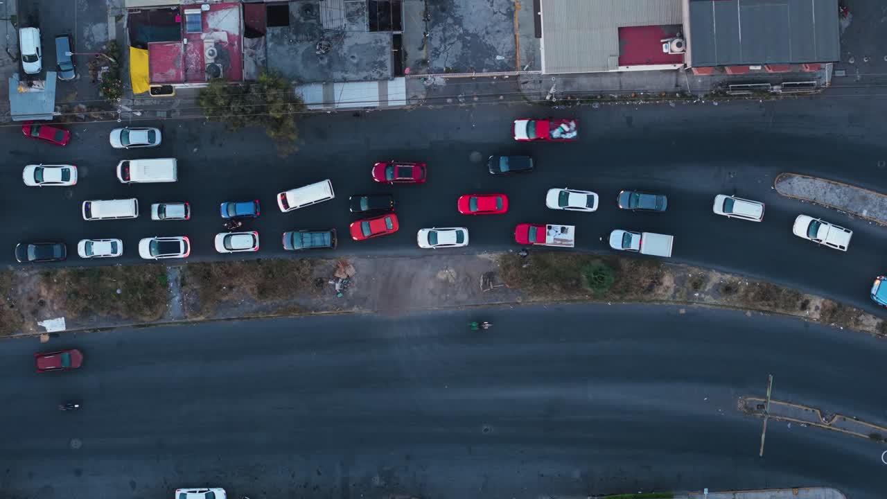 Top-down drone view of heavy traffic in the streets of Ecatepec