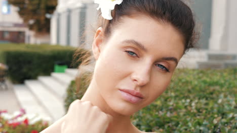 beautiful woman with flower in hair