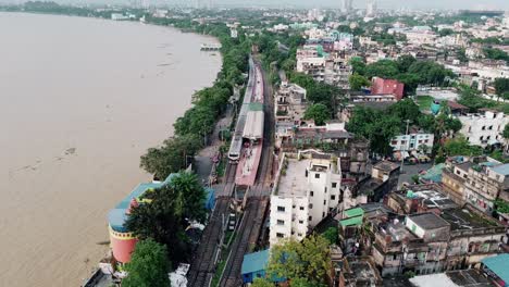 aerial view of kolkata city where train stands in the platform