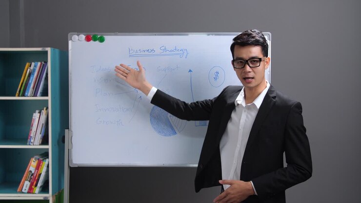 Uomo d'affari asiatico che fa coaching