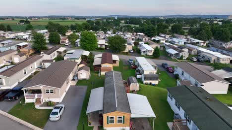 american flag at redneck mobile home trailer park in usa