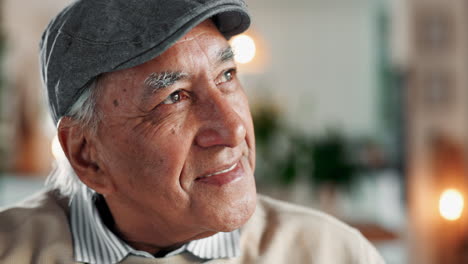 portrait of a smiling elderly man with a cap