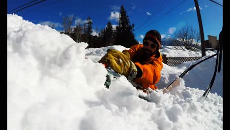 Man-clearing-snow-from-car-4k