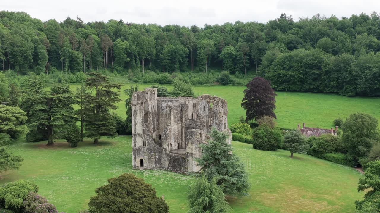 Aerial view of Old Wardour Castle in Wiltshire, England, beauty of medieval ruins nestled in lush British countryside
