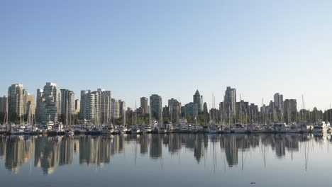 vancouver skyline with marina in foreground seen from burrard inlet