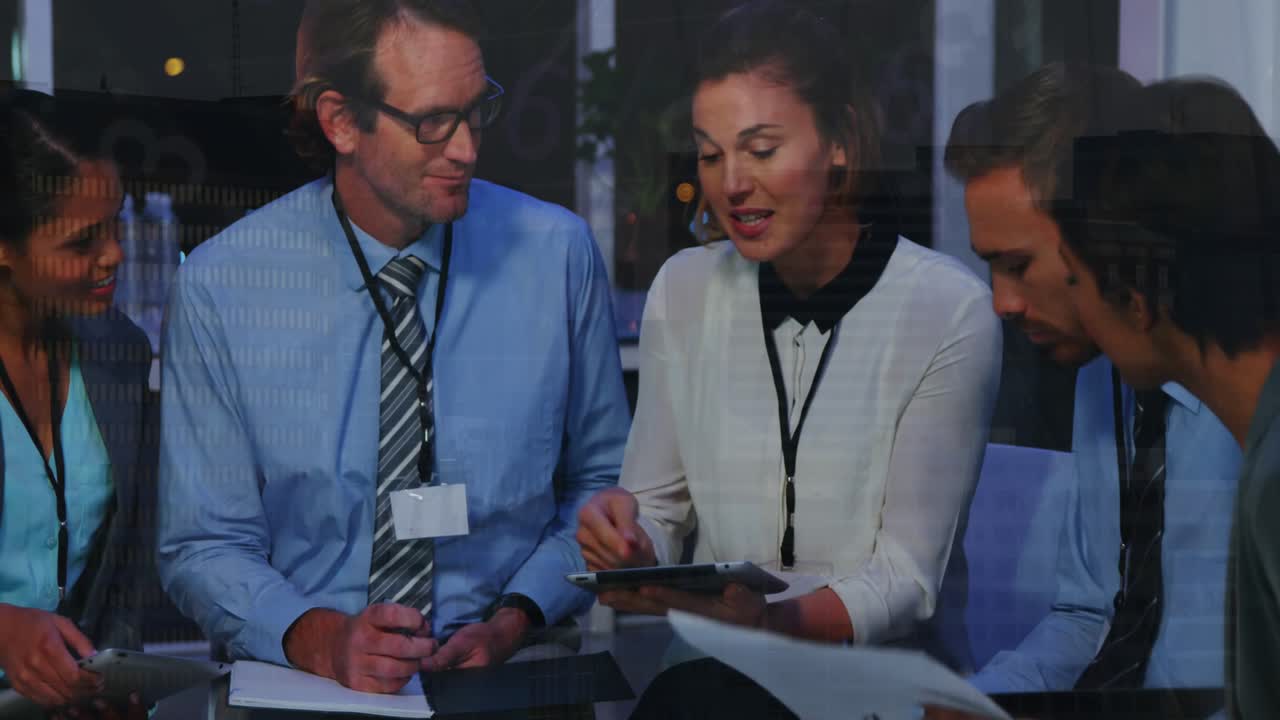 Animation of data processing and cityscape over diverse business people at office