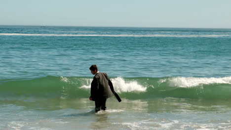 businessman walking in the water