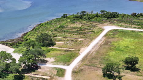 Drone-shot-of-Archaeology-dig-site-of-native-American-village,-rotating-aerial