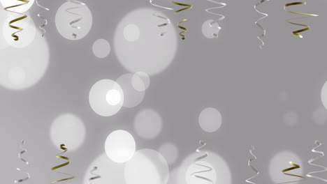 animation of party streamers and spots of light on grey background