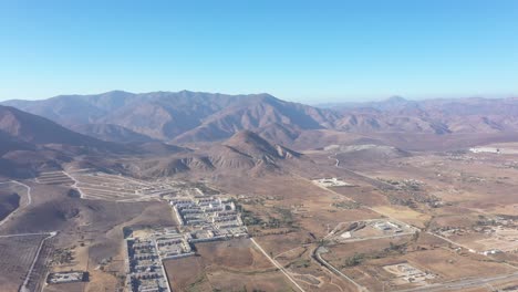 little town from tijuana, east side tijuana city, baja california, near the mountains and blue skies, dron footage 4k from a wide view from a little town tijuana