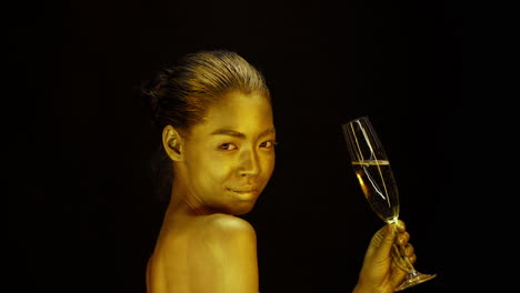 golden woman with champagne