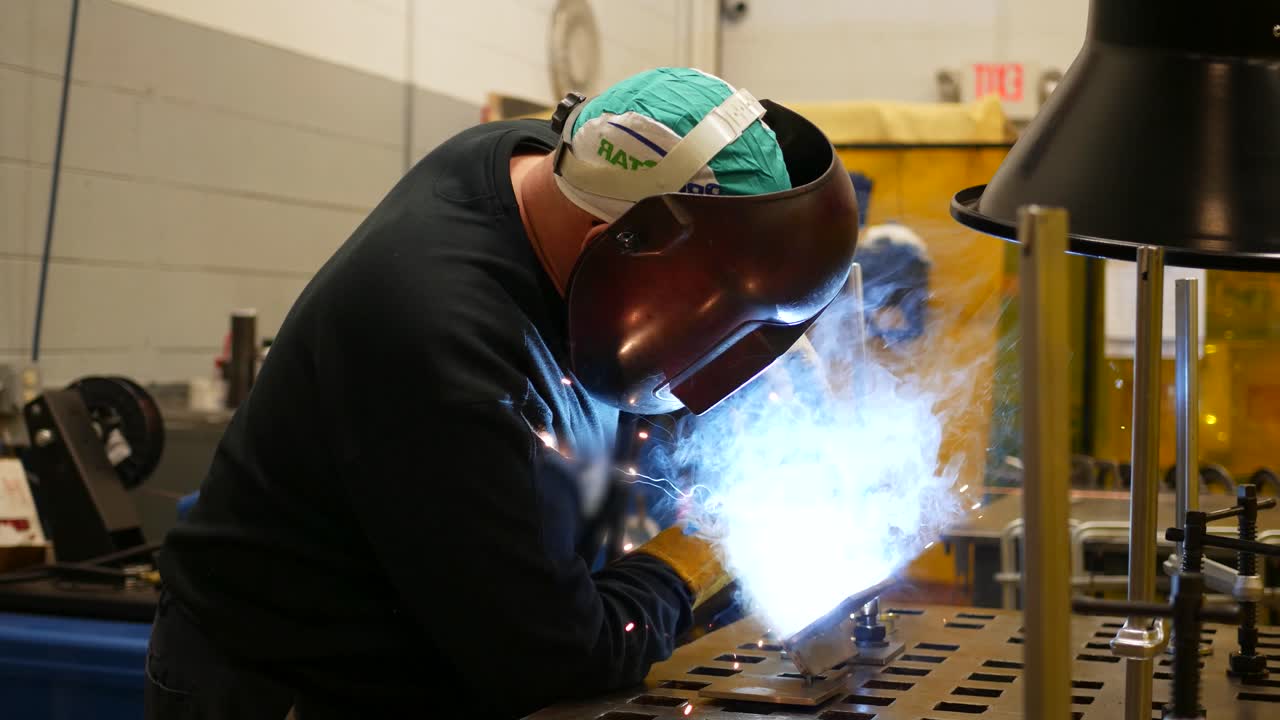 Welding Metal in an Industrial Setting