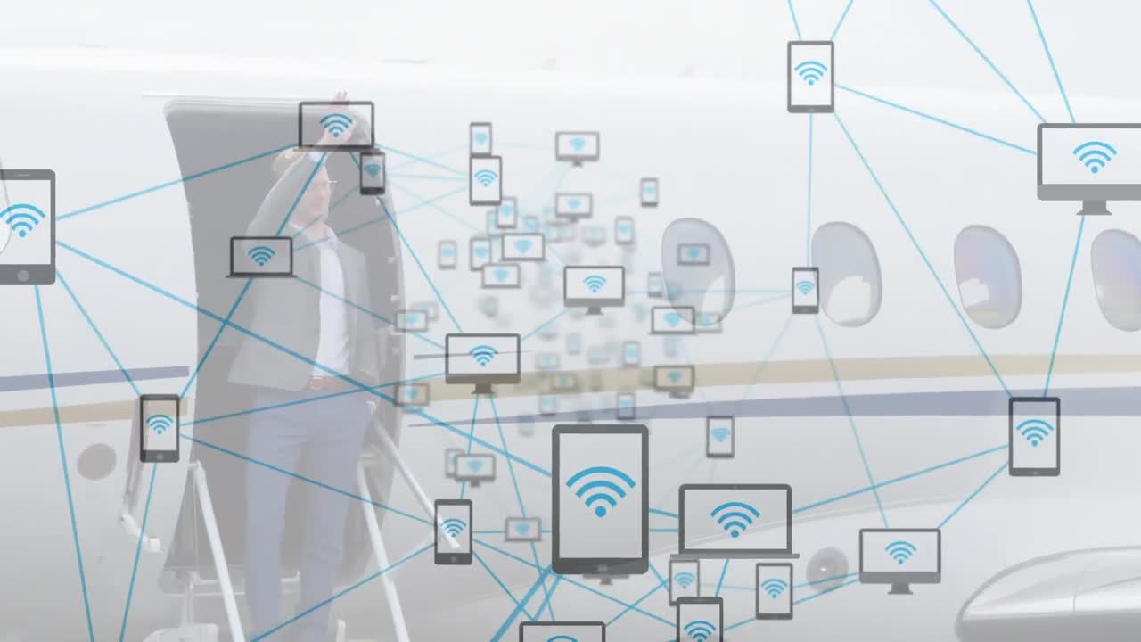 animación de una red de iconos digitales sobre un hombre de negocios caucásico saludando de pie en un avión