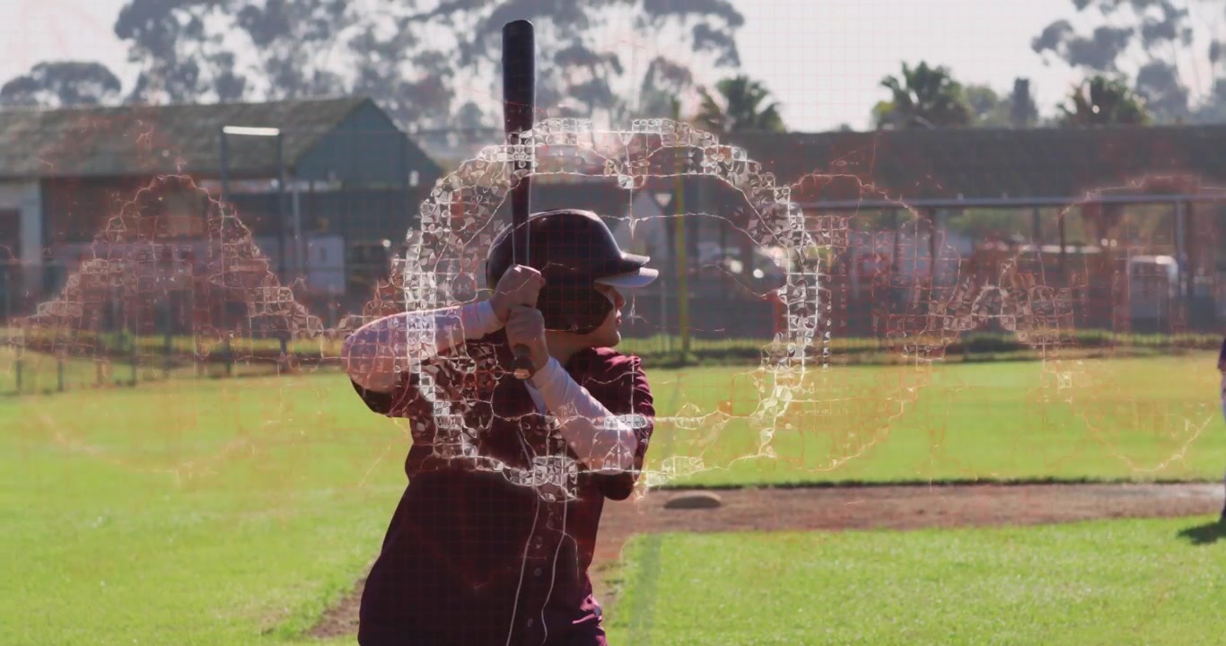 Battitrice che impugna la mazza, che avvia un anello digitale e che oscilla la mazza per approfondimenti sull'allenamento di baseball
