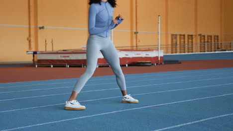 Woman-stretching-indoors