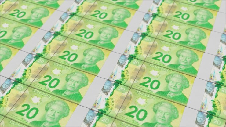 impresión de billetes de 20 dólares canadienses por una imprenta de dinero