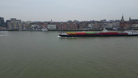 rulica inland, motor freighter vessel sailing in the river along the dordrecht city in netherlands