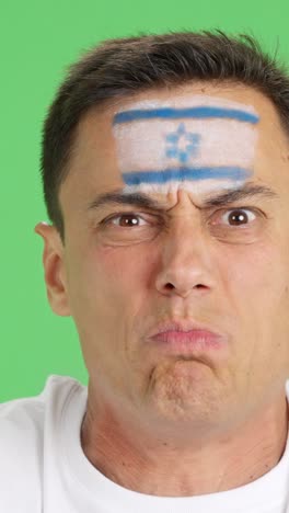 man with israeli national flag upset with a referee