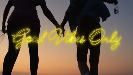 animation of text vibes over people by seaside