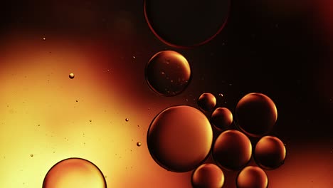 abstract colorful food oil drops bubbles and spheres flowing