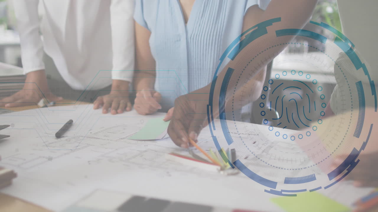 Architecture team reviewing blueprints and swatches, displaying biometric fingerprint overlay