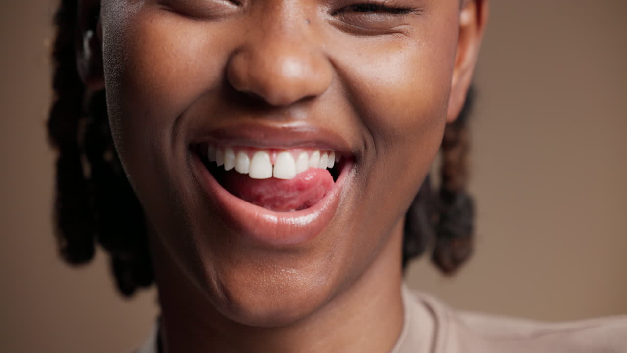 Close-up of a Smiling Woman with White Teeth