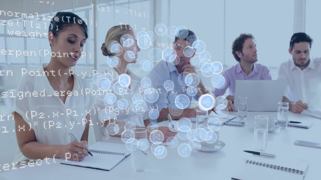 Animation of data processing and icons over diverse business people discussing work in office