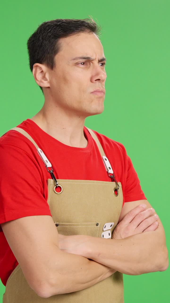 Serious small business owner looking at copy space