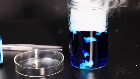 dry ice reacts with water, creating smoke