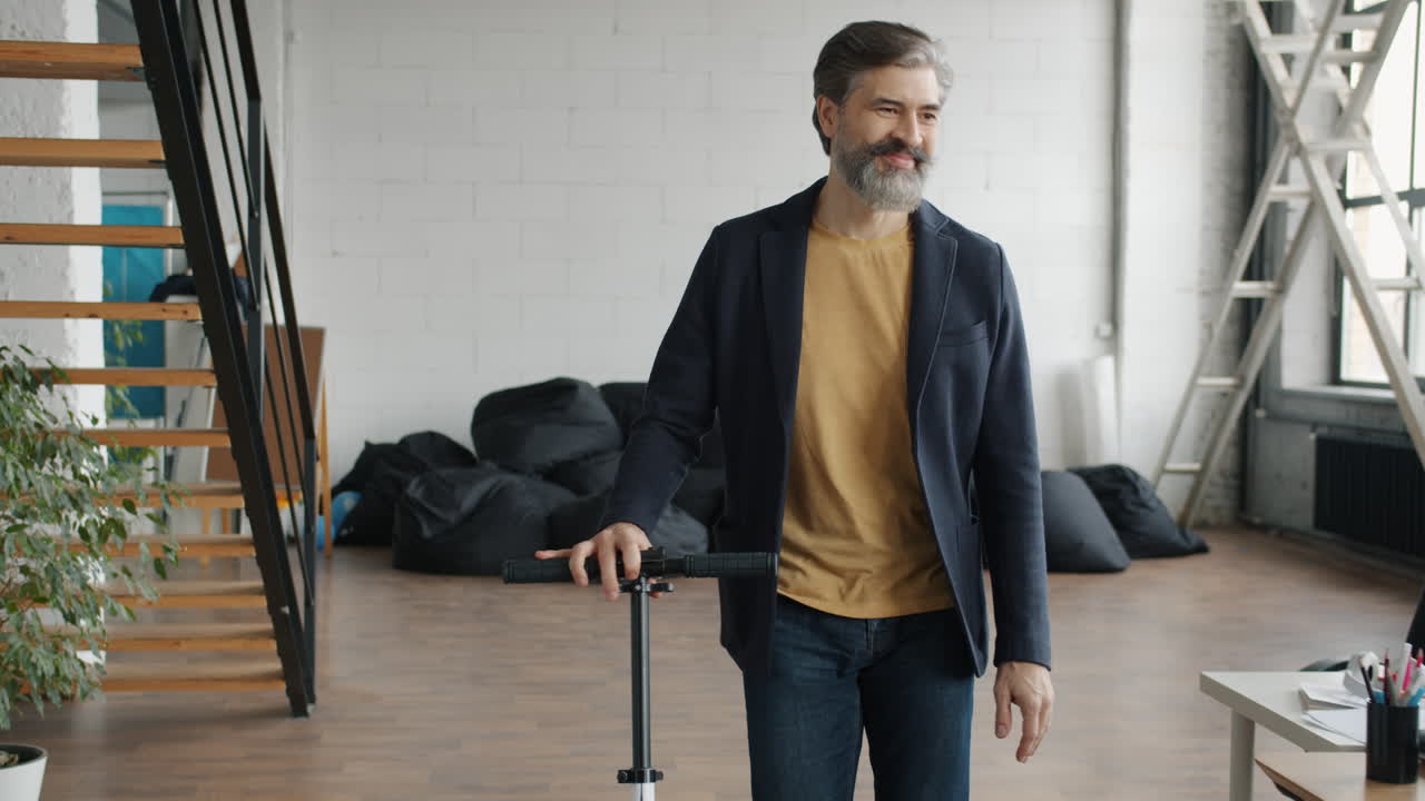 Businessman with Scooter in Open Plan Office