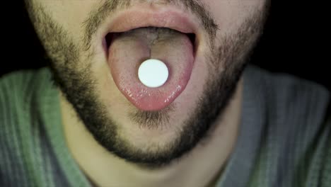 person taking a pill