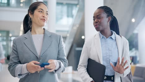 Lawyer,-women-talking-and-walking-in-office-lobby