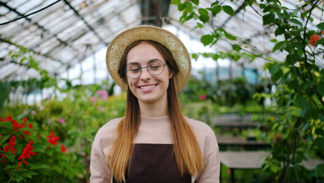 woman gardener in a greenhouse