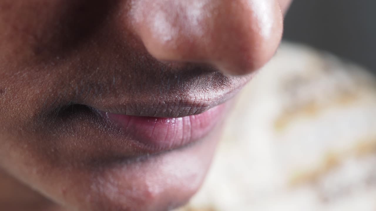 Close-up of a person's mouth and nose