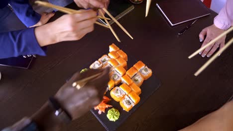 team lunch with sushi