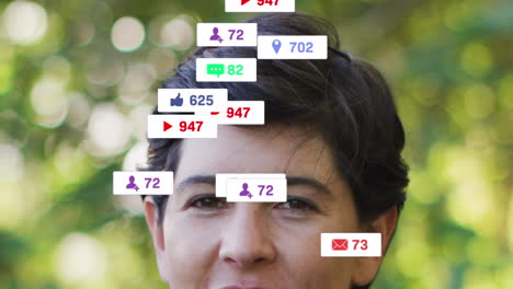 animation of social media icons and numbers over caucasian woman in garden