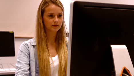 happy student working on a pc