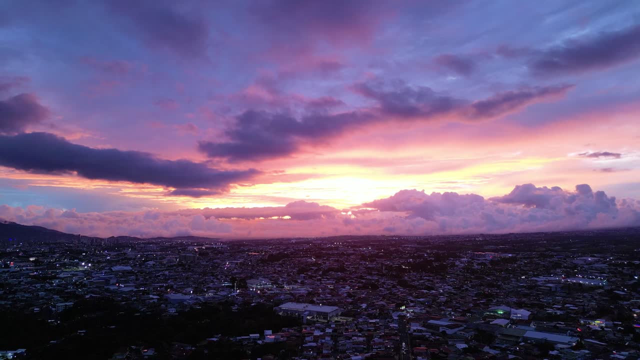 Still Drone Shot of Colorful Cloudy Sunset over San Jose, Costa Rica