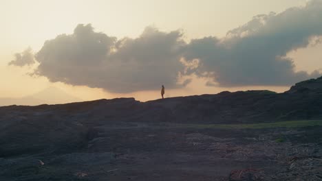 till against the storm – windy sunset coast
a peaceful yet powerful moment as a woman stands in solitude during a windy japanese sunset with clouds and sea in motion.