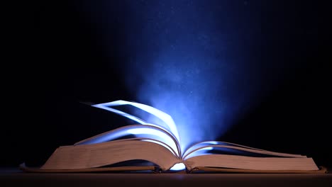 glowing open book